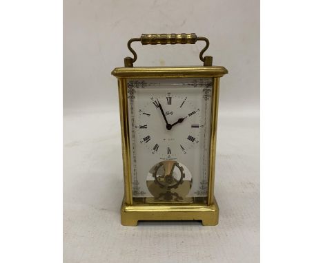 A VINTAGE GERMAN SCHATZ &amp; SOHNE BRASS 8 DAY CARRIAGE CLOCK IN WORKING ORDER NO WARRANTY GIVEN WITH WIND UP MECHANISM AND 