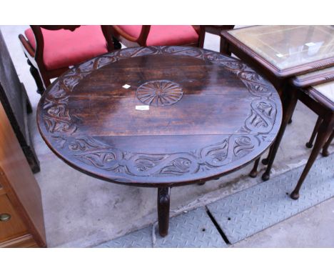 A VICTORIAN OAK CUT DOWN TRIPOD TABLE WITH CARVED TOP, 29.5" DIAMETER