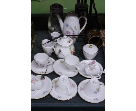 A GERMAN CHINA COFFEE SET TO INCLUDE A COFFEE POT, CREAM JUG, SUGAR BOWL, CUPS AND SAUCERS, PLUS A SADLER 'STRAWBERRY' TEAPOT