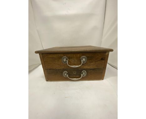 A VINTAGE OAK TWO DRAWER CASH TILL