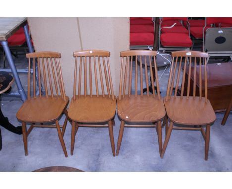 A SET OF FOUR ERCOL STYLE SPINDLE BACK DINING CHAIRS