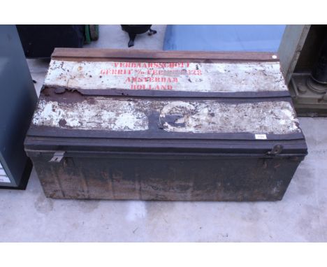 A LARGE VINTAGE TIN TRUNK