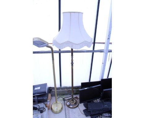 A BRASS EFFECT STANDARD LAMP