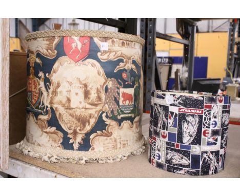 A LARGE LAMP SHADE WITH HERALDIC DECORATION, PLUS A SMALLER STAR WARS LAMPSHADE