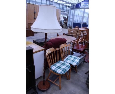 A PAIR OF PINE KITCHEN CHAIRS AND A STANDARD LAMP WITH SHADE
