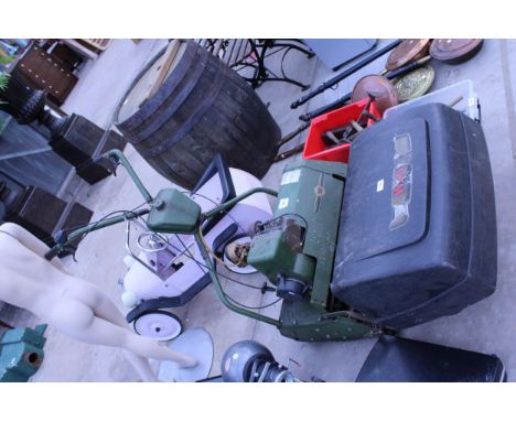 A LARGE WEBB PETROL ENGINE CYLINDER MOWER