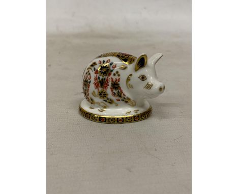 A ROYAL CROWN DERBY PIGLET (FIRST QUALITY)