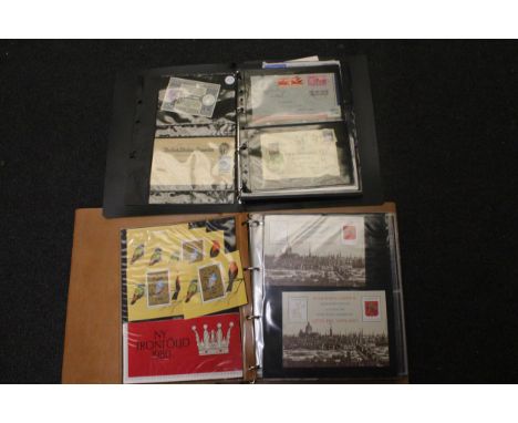 TWO ALBUMS CONTAINING FIRST DAY COVERS AND STAMPS FROM AROUND THE WORLD