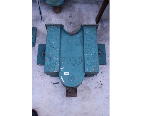 A VINTAGE DECORATIVE CAST IRON GUTTER HOPPER DATED 1931