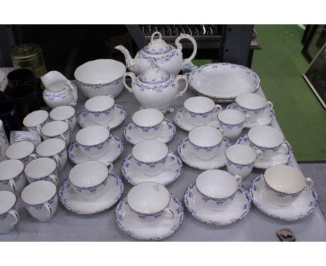 A VICTORIAN BLUE AND WHITE TEASET TO INCLUDE A FOOTED TEAPOT, LARGE SUGAR BOWL, JUG, CUPS AND SAUCERS PLUS LIDDED POT