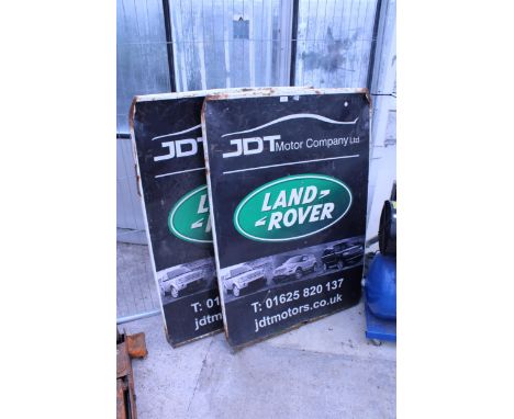 TWO METAL LAND ROVER ADVERTISING SIGNS