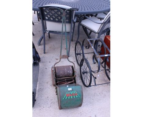 A VINTAGE WEBB PUSH ALONG CYLINDER MOWER