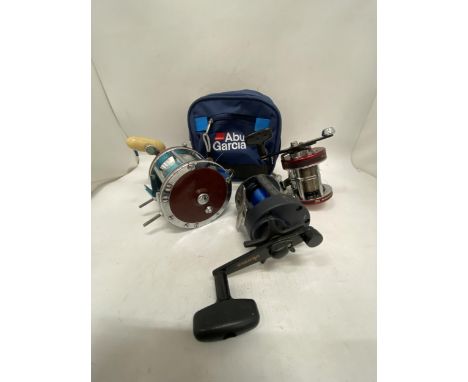 THREE VINTAGE FISHING REELS TO INCLUDEOKUMA, PENN SENATOR AND ABU GARCIER