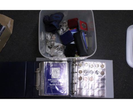 A PLASTIC TUB CONTAINING TWO BINDERS . ONE WITH UK COINAGE INCLUDING 3 X GV ROCKING HORSE CROWNS , THE OTHER CONTAINS THE NEW