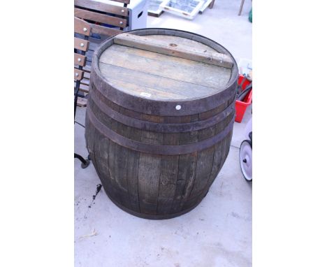 A LARGE VINTAGE OAK BARREL