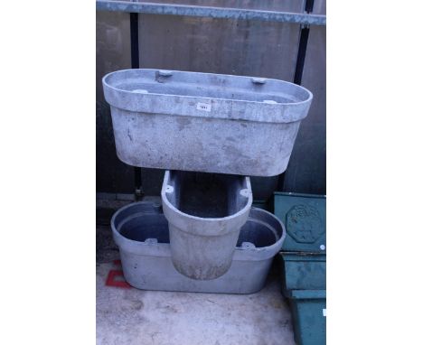 THREE GALVANISED CAST ALLOY TROUGH PLANTERS