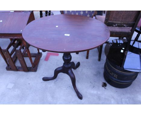 A 19TH CENTURY OVAL MAHOGANY TILT-TOP TABLE ON TRIPOD BASE, 29" X 23"