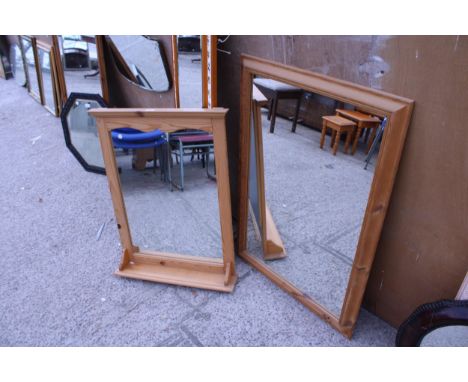 A PINE WALL MIRROR, 40" X 28" AND A PINE WALL MIRROR WITH SHELF, 33" X 25"
