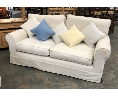 A modern country house sofa with cream loose cover, 205cmW 