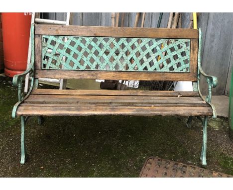 A green painted metal and wooden garden bench, 126cmW 