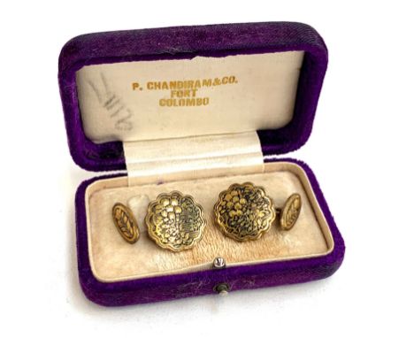 A pair of Japanese yellow metal damascene cufflinks, the reverse stamped with an elephant, 2cmD 