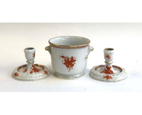 A pair of Herend Hungary hand painted candlestick holders heightened in gilt, 9cmH; together with a matching twin handled pla