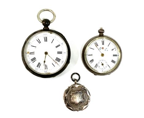 Two silver fob watches, one with enamel dial decorated with a floral spray, the case stamped 800 with a bird, 34mm dial; the 