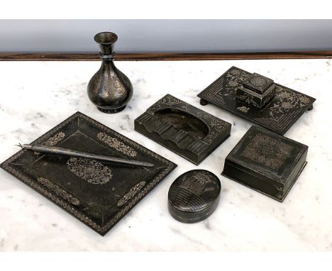 A collection of six Indian bidri desk items, to include a vase, 10cmH, inkwell, lidded pot etc