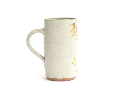 Henry Hammond (1914-1989), studio pottery stoneware tankard with tree design, makers mark HH, 15cm high; together with a tea 