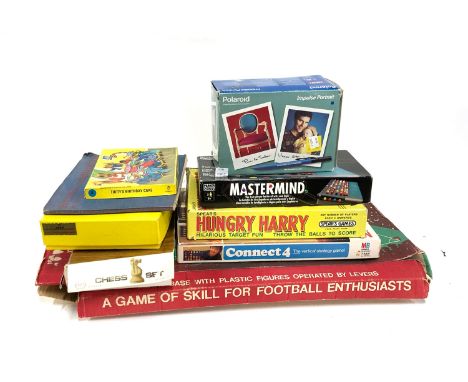 A mixed lot of board games to include Chad Valley Soccer game together with Connect 4, chess set, Hungry Harry, Mastermind, e