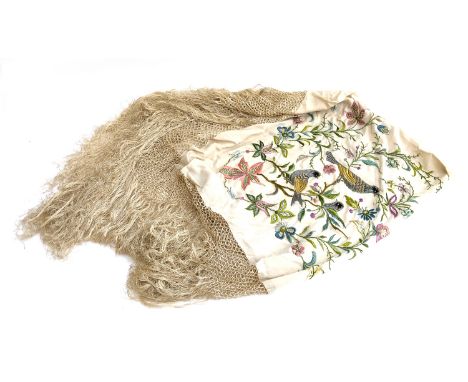 A 1920s cream silk piano shawl with fringe, embroidered with songbirds amongst flowers, the central silk panel approx. 115x11