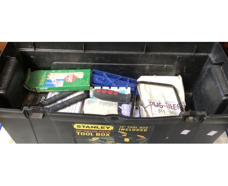A Stanley toolbox containing tile cutter etc; together with a Mitre saw