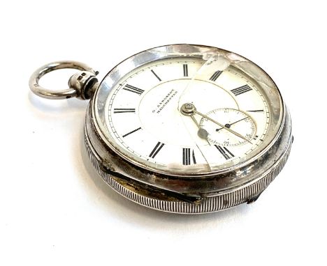 A large silver key wind open face fob watch, the white enamel dial signed 'G. Aaronson, Manchester', the case marked for Ches