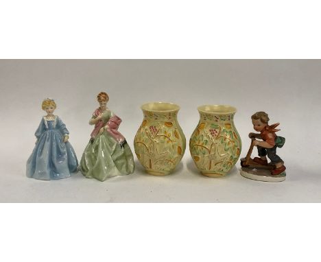 Two Royal Doulton lady figurines, 'Grandmother's Dress' and 'First Dance'; together with a pair of Crown Devon Vases; and a F