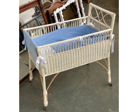 A white painted wicker cot, 81x48x87cmH 