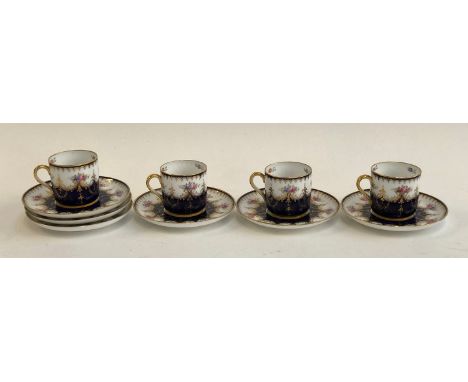 A Copeland Spode retailed by Harrods set of four coffee cups and saucers, the cups 5.5cmH 