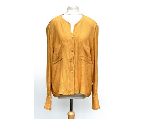 A vintage Valentino Miss V size 46 (12) yellow blouse, with double cuffs and padded shoulders, 