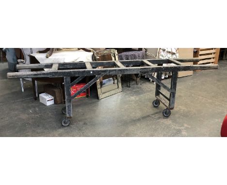 A Victorian costermonger's bench, on oversize casters, 290x54x81cmH 