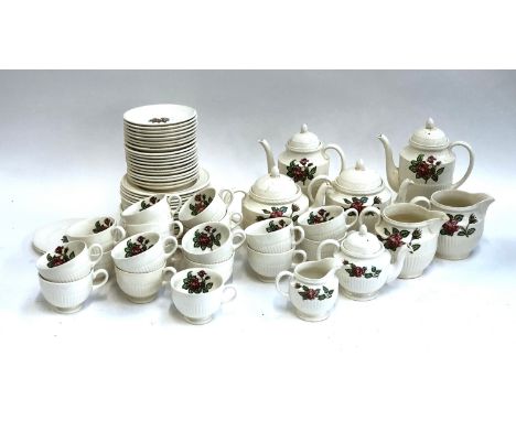 A Wedgwood 'Moss Rose' part tea set, comprising two teapots, two coffee pots, a smaller teapot, milk jug, two water jugs, tea