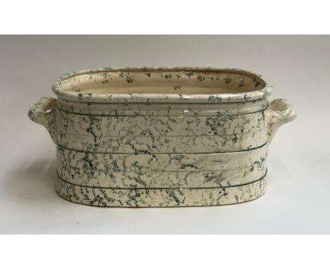 Interior design interest: A large twin handled ceramic foot bath/planter with green spongeware design, 55cmW