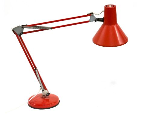A red anglepoise style lamp 