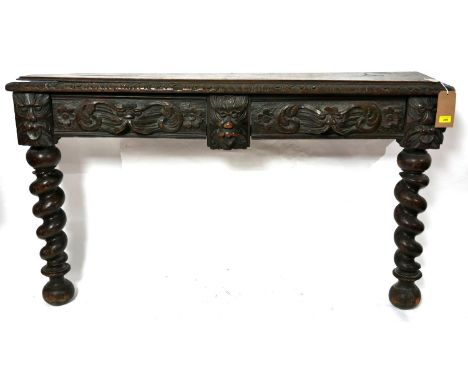 A Victorian carved oak console table with barley twist legs, H.86 W.148 D.33cm 