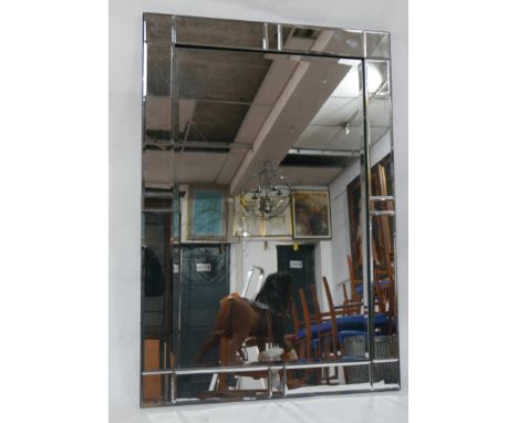 A contemporary mirror with bevelled plates, 100 x 70cm 
