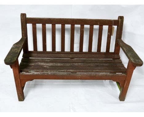 A weathered teak garden bench, H.81 W.130 D.60cm 