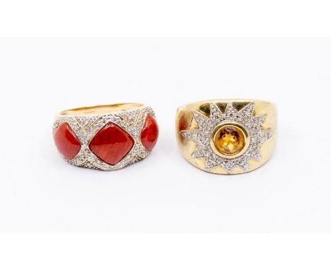 A 9ct gold citrine and diamond dress rings, comprising a round rub over set citrine within a star border of grain set diamond