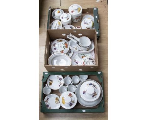 A Royal Worcester 'Evesham' collection of dinner wares, comprising mugs, side plates, biscuit barrels, bowls, vegetable dishe