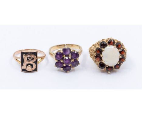 An early 20th century&nbsp; 9ct rose gold initial ring size M, a 9ct gold and amethyst set cluster ring, size N1/2 and an opa