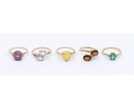 A collection of five Gems TV 9ct gold and gem set rings to include an Ethiopian opal ring claw set with a faceted trillion sh