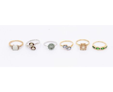 A collection of six Gems TV 9ct gold and gem set rings to include a opal, Andalucite, chrome diopside, possibly tanzanite etc