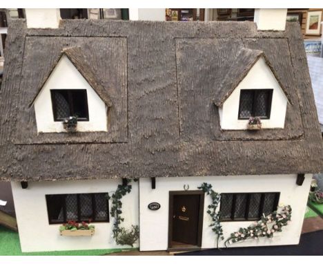 Dolls House: A quality dolls house built in the style of Robert Stubbs, called The Chestnutes. This was hand built by our ven